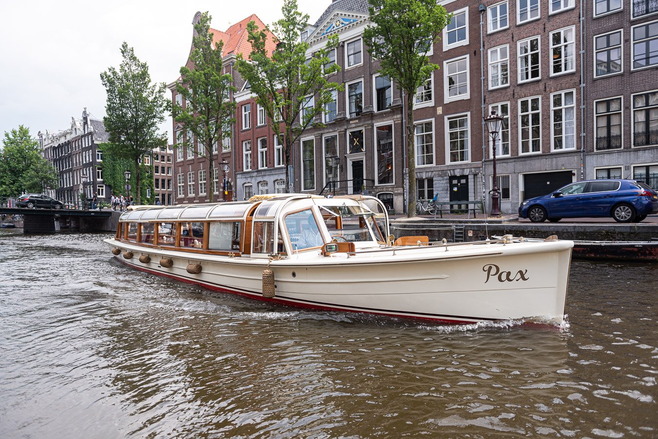 Canal cruisers in Amsterdam
