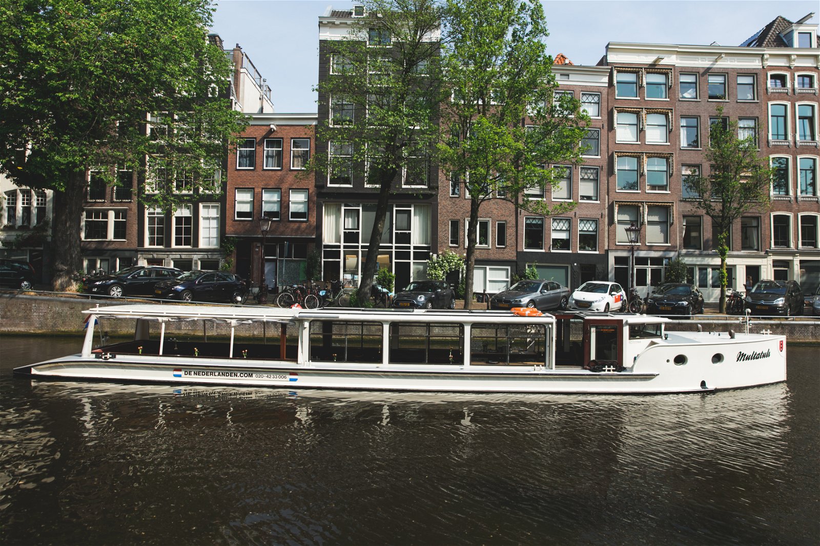 Modern large boat in the center of Amsterdam