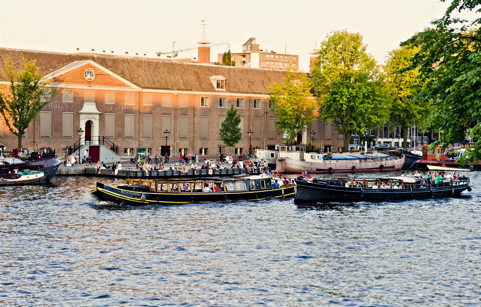 Two classic boats on Amstel canal